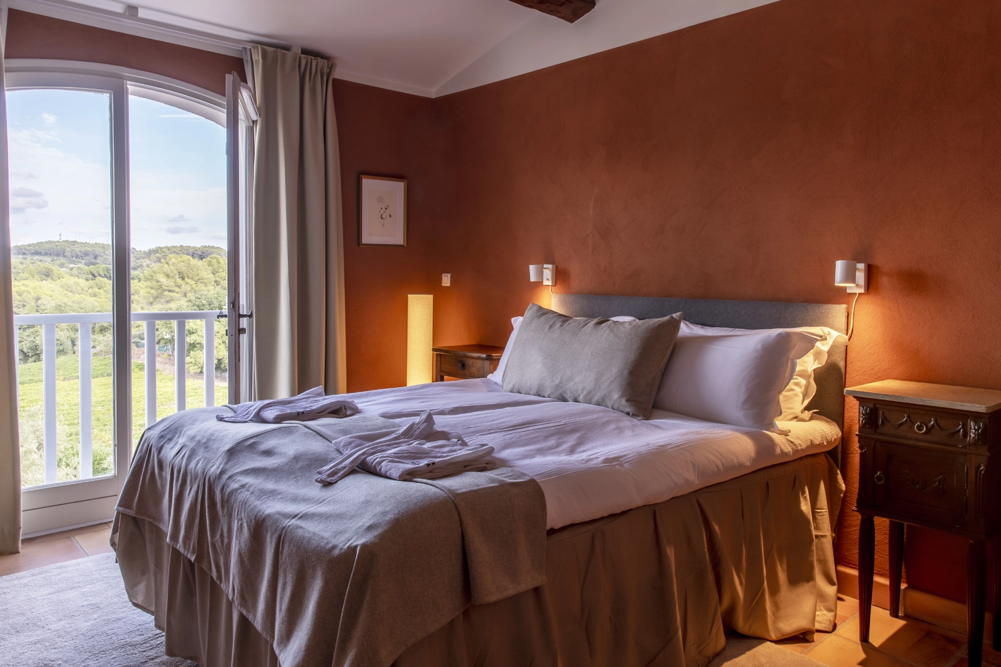 A queen size bed in classic double room